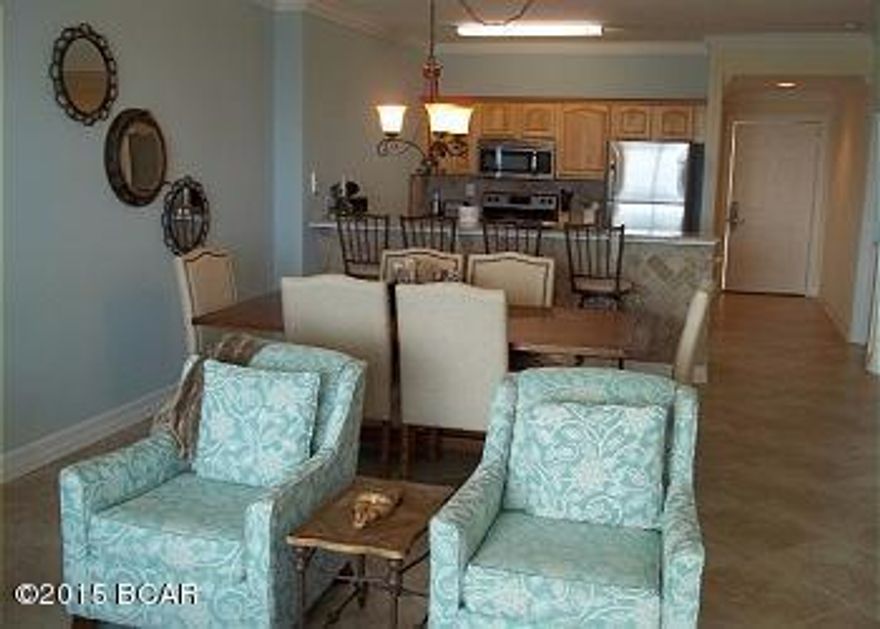 Ocean Reef #903 is a beautiful condo. NEW TILE PLANK FLOORS HAVE JUST BEEN PUT IN BOTH BEDROOMS. It has every upgrade that was possible at Ocean Reef. It has large tile floors from the front door to the balcony. Carpet is in both bedrooms. It has stainless steel appliances as well as tile on the back of counter and on the backsplash. It has a full washer and dryer. The oversized balcony makes for a wonderful view. This condo is furnished very well,not cheap ''condo'' furniture The bedding is top of the line pillow top.  The large screen TV in the den as well as the bedroom TVS are flat screen. It has a large wooden dining table for great family gatherings. It has a new custom paint job done earlier this year. It has a new hot water heater. Ocean Reef #903 has a profitable rental history with "See Ya At The Beach Vacation Rentals." The HOA at Ocean Reef is well run.