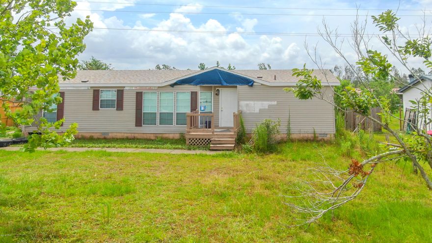 This 3 bedroom 2 bath home sits on a large lot in the Sweetwater Village Community. The home has a new roof and is ready for rehab, inside and out. Tons of potential here! This home would make a great full time residence, flip, or an addition to your rental portfolio. All sizes, dimensions and other info should be verified if important.
