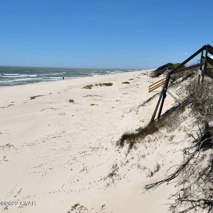 UNDER CONTRACT - TAKING BACKUP OFFERS!  Don't miss out!! Welcome to SGI! Once built upon, views of the Gulf of Mexico should be spectacular - and likely, good views of the Apalachicola Bay to the north as well. Stunning lot with great natural features: thick and diverse natural vegetation, nestled in a terrain with varied elevations. Great potential to design a unique residence. Full access via two roads: Gulf View Way to the south, and Resort Village Lane to the north; this leaves many construction options, including access from the north for an optimized view and proximity to the pedestrian beach access. Fire Hydrant on the northern side of the lot, on Resort Village Lane. Located in a new upscale neighborhood. The direct dedicated access to the beach includes a boardwalk over the dunes.