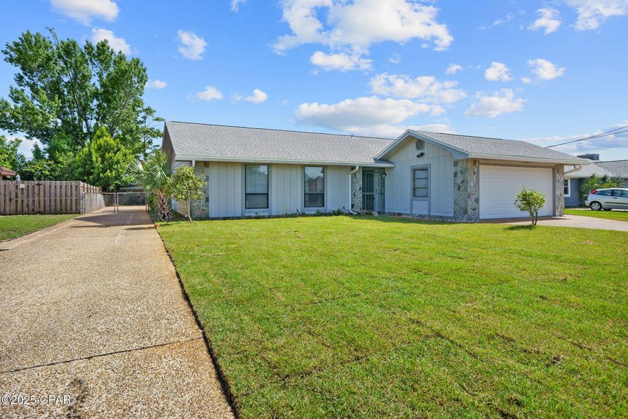 Under Contract - Taking Backups the phrase 'CURRENTLY UNDER CONTRACT, SELLER WILL CONSIDER BACKUP OFFERS' 

Charming 3-Bedroom Home with Detached Bonus Building in the Heart of Panama City

Welcome to 771 N Longwood Circle -a move-in-ready 3-bedroom, 2-bath home nestled in the desirable and well-established Huntingdon Estates neighborhood. This thoughtfully maintained property offers approximately 1,656 +/- square feet of heated and cooled living space, a spacious two-car garage, and a rare 590 +/- square foot detached accessory building complete with power, water, and sewer. Whether you need a workshop, home office, creative studio, gym, or extra storage, this versatile bonus space has you covered.

Inside, the home features a smart, open-concept layout where the living and dining areas flow seamlessly—anchored by a bright, functional kitchen with ample counter space and cabinetry. The floor plan includes a private primary suite with an en-suite bath, plus two additional bedrooms and a full hall bath designed for comfort and functionality. Recent upgrades include a new water heater (2025), new luxury vinyl plank (LVP) flooring in the hallways and bedrooms, updated plumbing fixtures, and new ceiling fans throughout.

Outside, fresh Zoysia sod has been installed in both the front and backyard, supported by an irrigation well. The new yard not only adds lush, inviting curb appeal but also reflects the pride of ownership shared by many neighbors throughout this established community. A double-width driveway provides ample off-street parking and includes gated access to the fully fenced backyard and detached bonus building—ideal for trailers, tools, or home-based business needs.

Tucked away on a quiet, low-traffic street, the home is just minutes from the new Publix at SweetBay, local schools, hospitals, and both the Navy and Tyndall Air Force Bases—making it an ideal location for both convenience and community.

Whether you're a first-time homebuyer, downsizing, or seeking extra space for your passions or projects, this home offers more flexibility—and lives larger—than competing homes at this price point.

Don't let this rare opportunity to own a home in a desirable neighborhood get away. Schedule your appointment today!