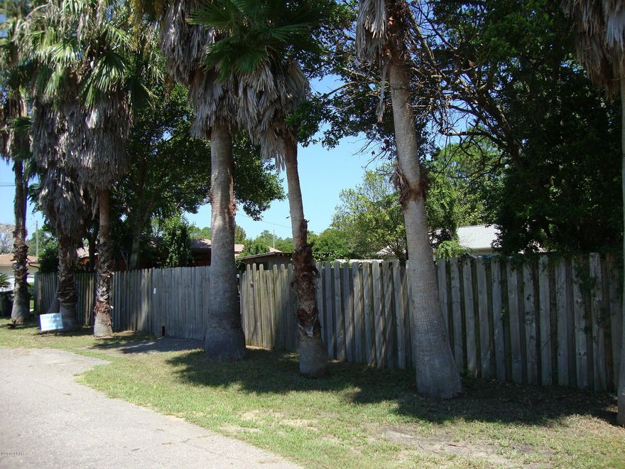 CURRENTLY UNDER CONTRACT.  SELLERS ARE TAKING BACKUP OFFERS.

One Block from the Gulf of Mexico and its sugary white beaches, this desirable building lot is in popular Laguna Beach.   In a quiet area with nice surrounding homes, the lot features 8 very tall palm trees across the front of the lot,, a shallow well for irrigation, and access to City sewage runs in front of the lot allowing for a larger home to be built.   Owner says you would be able to have a view of the Gulf from the third story of a three story home. The portable storage shed on property will remain on property or if buyer desires removal, Owner will remove.