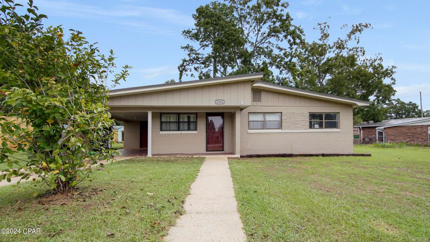 Awesome opportunity in Graceville! This 3 Bedroom 1 Bath home sits in the heart of Graceville, FL, and is less than 200 feet from the Florida Baptist and Theological College. Inside, this home offers 3 Beds and 1 Bath on one end, while boasting both a living room and bonus room split by a well utilized kitchen on the other. Outside, this home offers a large fenced backyard, dog kennel, and an outbuilding that makes for perfect storage or a workshop. This home also offers an attached carport for covered parking, and a small covered porch. On top of all of this, it is located less than 30 minutes from the ever growing Dothan, AL. Schedule your showing on this gem today!