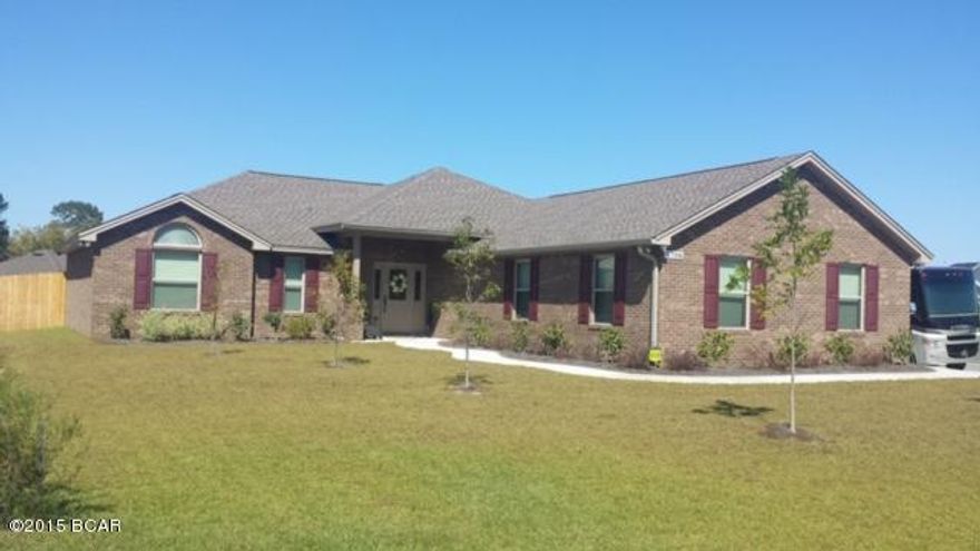 FABULOUS, ALMOST NEW BRICK HOME COMES WITH A FENCED YARD, SECURITY SYSTEM (WITH CAMERAS), AND THE HOT TUB IS INCLUDED WITH AN ACCEPTABLE OFFER. A SCREENED PORCH OVERLOOKS THE BACK YARD.  OVERSIZED GARAGE, PLUS SEPARATE STORAGE AREA FOR TOOLS. GRANITE COUNTERTOPS AND UPGRADED APPLIANCES IN KITCHEN. TREY CEILINGS AND CEILING FANS, REMOTE CONTROL FIREPLACE. TILED AND WOOD FLOORS. FULLY TILED SHOWER WITH DUAL SHOWER HEADS AND RAINMAKER SHOWER HEAD IN MASTER BATH AND DOUBLE VANITY. LARGE WALKIN CLOSET. WINDOW TREATMENTS INCLUDED. HOME IS BUILT TO 140 MPH WIND CODE.