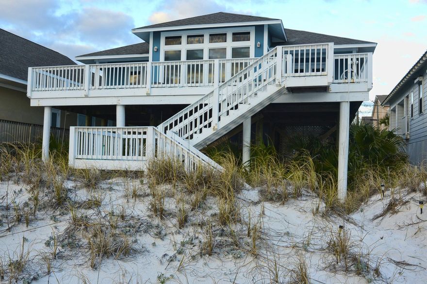 GULF FRONT AWESOMENESS. 10 DOORS WEST OF SCHOONERS. FANTASTIC BIG VIEWS WITH 10FT CEILINGS LARGE AREAS TO ENTERTAIN AND SPREAD OUT. ENJOY YOUR FABULOUS SPACE AT THE MOST BEAUTIFUL BEACHES IN THE WORLD. THIS HOME IS TURN KEY AND IS READY FOR YOUR FAMILY TO ENJOY. RELAX ON THE LARGE PORCHES OVERLOOKING THE GULF WATCHING THE DOLPHINS PLAY AS YOU SIP YOUR MORNING COFFEE. SELLERS ARE AN ESTATE THAT DOES NOT USE ANY MORE.SELLING AT AN INCREDIBLE PRICE.