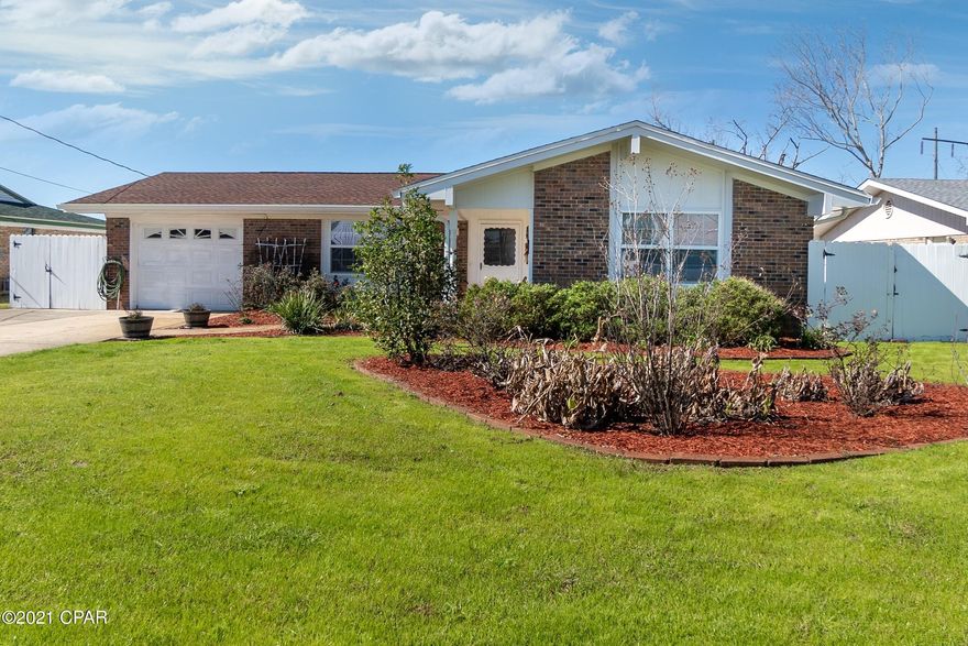 CURRENTLY UNDER CONTRACT, SELLER ACCEPTING BACKUP OFFERS: 

 Convenience and Curb Appeal!  Are you the type of home buyer that would love to have access to shopping and the availability of restaurants just moments away from your door? Do you not want to drive far away to get your groceries or home supplies? What about privacy you ask.  Well, ask no more. I have the perfect updated home for you. This remodeled 3/2 features all the benefits of a new home at an extraordinary price.  New roof,  new flooring, fresh paint, new ac/heat are just a few of the amenities included with this home. From the decorative ceilings, updated baths, private well to the vinyl fenced privacy of the lusciously landscaped backyard and large patio, there is much to fall in love with.  The back of the home is like