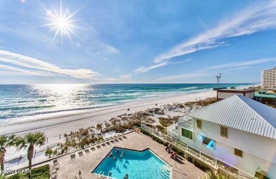 *FURNISHED & GULF FRONT* beautifully maintained condo with panoramic beach and ocean views! This property has it all:  tennis courts, pickleball, hot tub, and twin pools overlooking the gulf!  Ride the elevator down and walk out to the beach! Excellent location in the heart of Panama City Beach so close to local events, beach front dining, local health & wellness centers, winery's Golf & Tennis!! Plenty of parking for owners and guests.  Pelican Walk is a sought after location for legacy guests!  Unit 809 features updated kitchen and 2 FULL BATHS on the 8th floor!  King bedroom with full bath and Queen pull out couch in common area with 2nd full bath! This unit has NEW Hurricane grade sliding glass doors open to paradise! The kitchen features granite counters & bar, stainless appliances, and white cabinetry! 
 Updated lighting and plumbing hardware throughout.  The bathrooms are recently updated with granite and beachy white accents.  HVAC 6 years young, Water Heater 4 years young.  Pelican Walk has excellent management and unit 809 has rental income potential of $35-45k annually at half occupancy(AirDNA)!  *Sold Furnished excludes 3 pieces of personal art.  Buyer to confirm and verify all details of property marketed. OPEN HOUSE DATES SHOWN BY APPT BETWEEN GUESTS:  4/18, 4/19, 4/21-4/30, 5/2, 5/3, 5/17, 5/22-5/31.  6/1-6/14