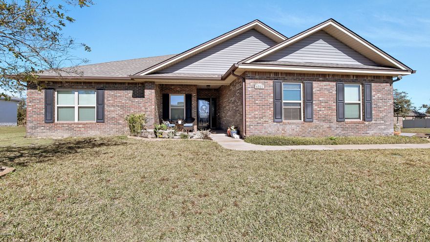 This gorgeous, custom house has so many features! Close to Tyndall AFB. 4 bed, 3 bath with tray ceilings, engineered hard wood flooring and lots of space. It comes with a termite bond, 50 amp camper hook up, underground drainage system for rainwater, ring cameras and doorbell and a Nest Thermostat. Lovely custom built stone fireplace and cedar mantle. They have a shed out back, 12x20 with electrical already run to it. The yard has a new fence , installed 2018, new roof in 2019. They have an irrigation system which is run from a deep well. They have a fully functioning, established and producing garden with irrigation. Attic storage also! What a great find! Split floorplan... Plan to relax in the heated jacuzzi tub when you make you make this house your own! *All Measurements Appro Lots of military families in this neighborhood since it is close enough but not too close to base. New sod has been added to the yard as well. Birds of Paradise and other lovely plants are already started- this house is move-in ready!