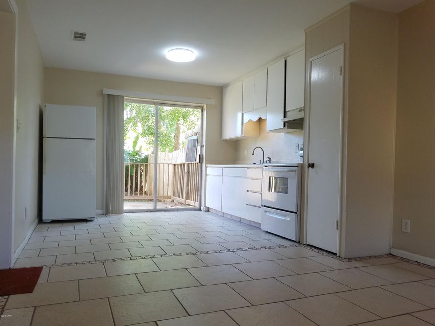 For Lease - Located in East PCB, 1 BR, 1 BA first floor unit in a triplex that has an attached garage for additional storage! Tile flooring throughout; Updated bathroom with wide vanity and a linen closet; Large master bedroom with double closet; Kitchen includes stove/oven and refrigerator; Spacious living room; This is a quaint neighborhood in the N. Lagoon and Thomas Drive area. **Pets negotiable upon approval with non-refundable $350 pet fee. *Rent Includes Water, Sewer, Garbage.