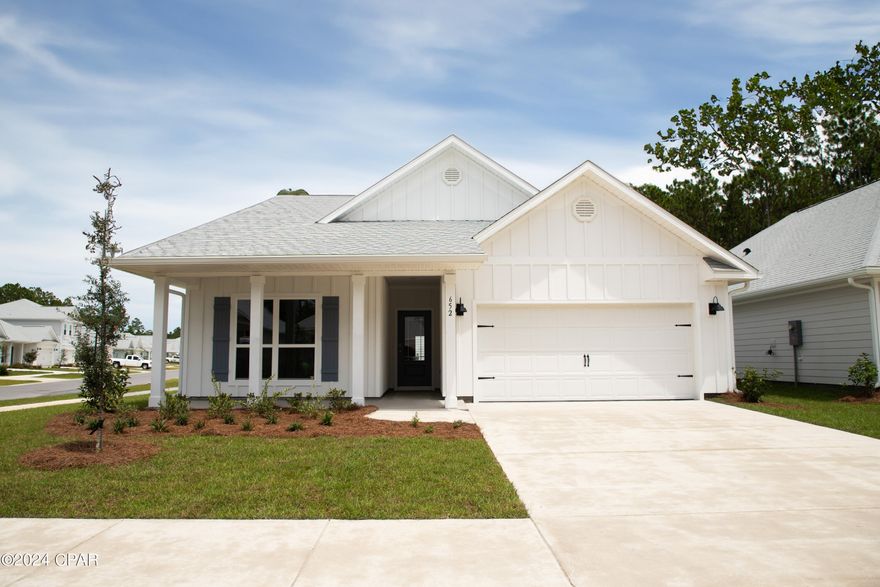 Bayside at Ward Creek is at the heart of Panama City Beach, accessible by sidewalk to Pier Park, Frank Brown Park, and the Conservation Park with the Gulf of Mexico less than 3 miles away. | The Delray plan is a 1 story home featuring 4 bedrooms and 2 bathrooms. There is EVP flooring throughout the home and boast a large living space. The primary bedroom features a beautiful en-suite with a modern tiled shower and two closets.