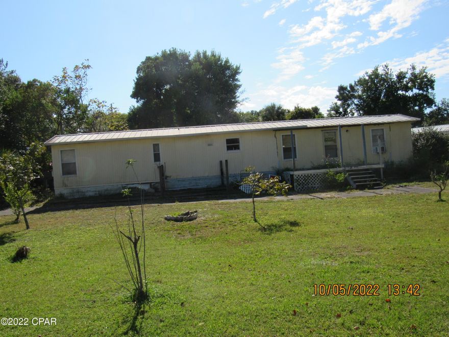 INVESTMENT OPPORTUNITY : PANAMA CITY BEACH ! Great for a rental, flip or remodel. Home sits on a large lot in a nice residential neighborhood. Less than 5 minutes to the beach. Location is key being only 6 minutes to Famous Pier Park Shopping, less than 15 minutes from TWO State Parks and just a few miles down the road from some of the best Salt Water Fishing on the planet ! Nestled right in the middle of some of the most iconic Panama City Beach Restaurants and Nightspots makes this property even more valuable. With new business opportunities coming to the area daily, you will want to come and check out this unusual newly listed investment possibility.  Call today for more information. only cash offers