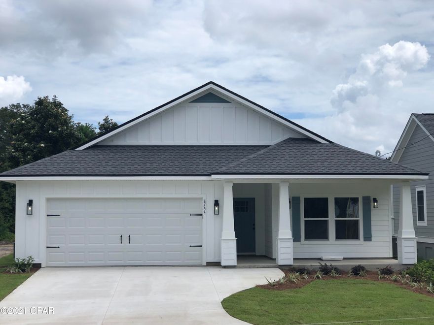 NEW CONSTRUCTION!! This 4 bedroom 2 bathroom house sits on one of the most pristine roads in Bay County with water views from your front porch and less than a mile from the beautiful Gulf of Mexico. The home features an open concept living space for smooth transition from room to room and to the outdoors. Enjoy the Granite countertops throughout, double vanities in the Master bath with an oversized custom floor-to-ceiling tile shower and large walk in closet. Equipped with beautiful Stainless steel appliances, 9ft kitchen island, luxury vinyl plank flooring, 9ft ceilings throughout with trey ceilings in the great room and master bedroom, 2-car garage, irrigation, and two covered porches to give you plenty of space. Sort term rentals are allowed in this area.