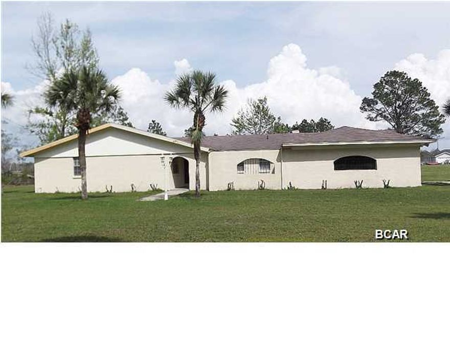 Very nice home with hardwood floors, carpet and tile, formal living and formal dining room, breakfast bar, den, fireplace, large screened porch and 2-car garage. Close to Tyndall AFB.