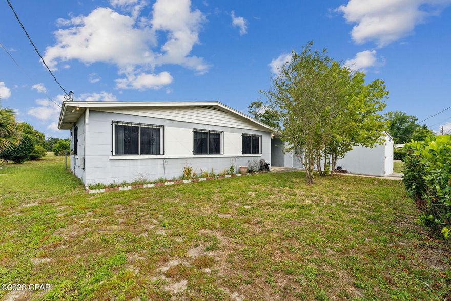 Fantastic price and location! This 3 bedroom/1bath solid cinder block home is perfect for the savvy investor or 1st time home buyer. The property backs up to the open fields of Parker Sports Complex, with no buildings behind the house! Features a separate laundry room, bonus room for office, playroom, man cave/she-shed and a single car garage. The metal roof is less than ten years old (great for insurance purposes). Home sits on a large lot, close to Tyndall Airforce Base, Parker School, Lake Martin and Parks and Recreations. Call today to schedule your appointment.