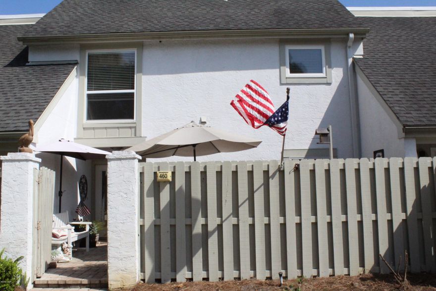 Must See Completely Remodeled in 2016 Lower Level Condo on 18th tee box Nicklaus Course. Updates include beautiful kitchen with an abundance of cabinets and lovely quartz counter tops, stainless steel appliances, new vinyl plank flooring throughout, new lighting throughout, both bathrooms have been updated, new three panel doors with bronze hardware & custom trim, large living & dining room great for entertaining, wood burning fireplace, master bedroom suite with full bath and walk-in closet, 2nd bedroom with full bath and walk in closet with shelving. Separate laundry. Large hallway storage closet. Roomy deck off back of condo with gazebo and beautiful pond & golf course views. New Roof and much more! Measurements Approx buyers please measure.  Tennis, Marina & Golf memberships available.