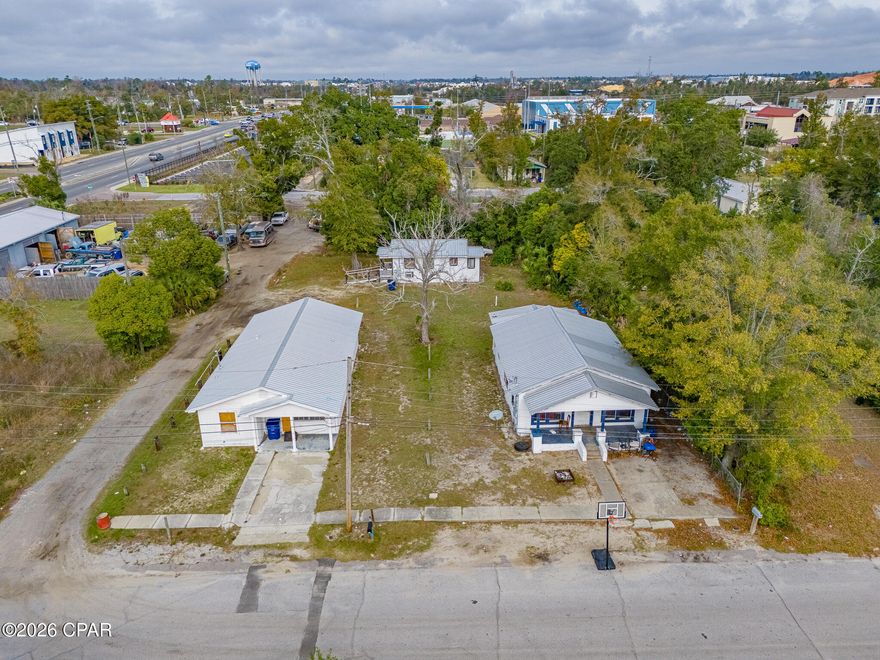 Investor Special - Rare Multi-Dwelling Opportunity in Prime Panama City Location!

Priced to sell and packed with potential, this unique property features three separate dwellings on approximately .30 acres, offering endless possibilities for savvy investors or multi-generational living. With a combined 8 bedrooms and 4 total bathrooms, this is a rare chance to create strong rental income or a private family compound where everyone enjoys their own space. 2 of the dwellings are currently rented but DO need work to make optimal. Second home on left of pics is incomplete, making a blank slate for your desired renovation. 

Located just one block from MLK Jr. Blvd, a major thoroughfare, and a block from a brand-new park, the property also sits minutes from Ascension Bay Hospital, one of the area's most renowned medical facilities—making it highly desirable for tenants. A perfect location for traveling nurses, anesthesiologists and other medical professionals to rest between shifts at the hospitals! Centrally located to shopping, dining, and everyday conveniences, and just 15 minutes from Panama City Beach, this location checks every box.

While the homes do need work, they offer an excellent opportunity for renovation, conversion, or a full flip with significant upside. Whether you're looking to maximize cash flow, redevelop, or customize to your vision, this property delivers flexibility and long-term value.

Highlights:

3 dwellings on approx. .30 acres

8 bedrooms / 4 bathrooms total

Ideal for rental income, flipping, or family compound

Near Ascension Bay Hospital

One block from new park & MLK Jr. Blvd

Central Panama City location

15 minutes to Panama City Beach

Opportunities like this don't come around often—bring your vision and unlock the potential of this income-producing property!