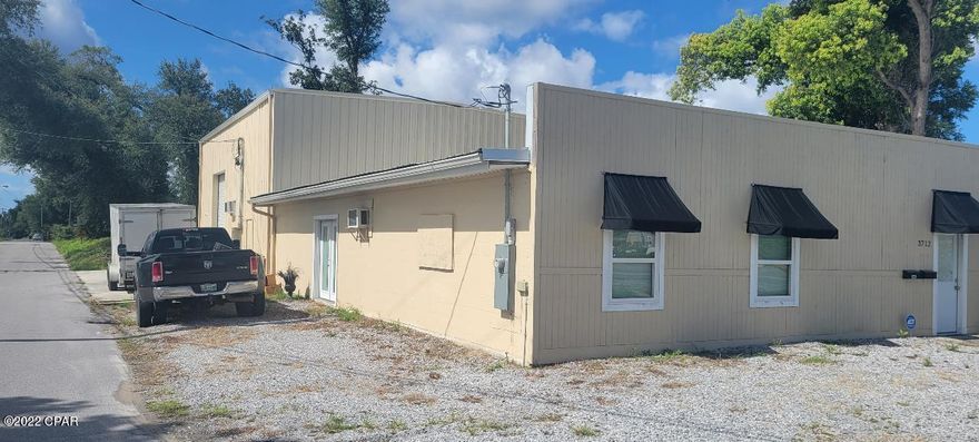 Commercial space with a new walk in cooler freezer and large ice machine. Two offices, kitchen and spacious lot. Great for any buisness that processes food or a commercial kitchen. Presently leased to two businesses income 6600 per month. Some equipment may not convey.