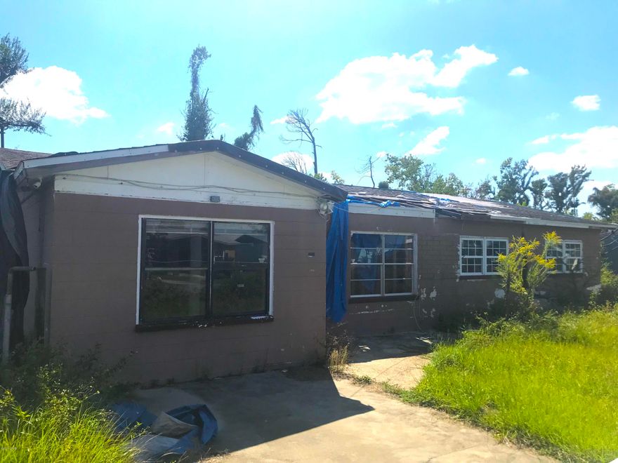 SUPER fix & flip or investment opportunity for this 3 Bedroom / 2 Bathroom home in Panama City, FL! This home is 1,384 sqft. (heated) and sits in the heart of Callaway, close to all of the shopping and amenities you could need, along with being just minutes from Panama City Bay and boat launches - AKA great location! The home has damage from Hurricane Michael, but a lot of work has already been done - Bad drywall was removed, Etc. But the home will still need more - Drywall, New Roof, Paint, Etc. to maximize its full potential. See this one quickly because IT WILL NOT LAST LONG!     ----- CASH BUYERS ONLY -----