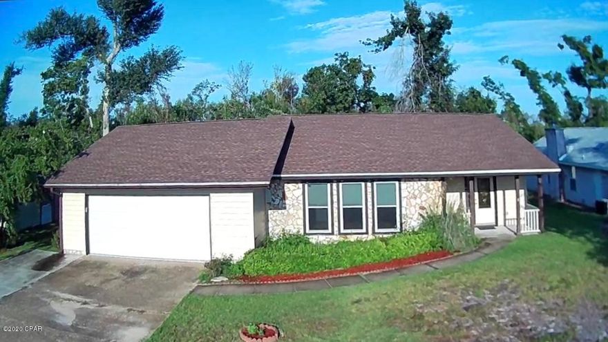 Spacious Home located in one of the more desirable neighborhoods in Callaway. The front door opens into a unique addition for welcoming guests and enjoying quiet conversations without entering the main house. The L-shaped living room has tons of natural light, two ceiling fans and is accessible from 4 different entrances. Enjoy time together and games in the cozy family room with gas burning fireplace and beautiful mantel. The split bedroom floor plan has a large master bedroom with private bath and walk in closet. The kitchen is spacious and practical with newer appliances and two entrances. Enjoy quiet reading or a dinning space in the heated and cooled  Florida room with windows all around that adds an extra 336 square feet. The large back yard has a wood deck to enjoy that morning coffee or those BBQ get togethers. Feel safe during any rough weather with professionally installed hurricane shutters at all doors and windows.. This is a great price for a great family friendly neighborhood that is close to Tyndall AFB, shopping, parks, water activities, schools and restaurants. No worries and peace of mind with a one year home warranty.