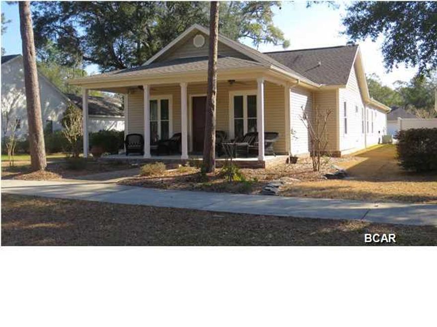 This custom built 3 bedroom 3 bath home in the park-like community of Riverside is Nestled on a cul-de-sac, this home opens to a pedestrian-only courtyard with sidewalks and natural landscaping that includes mature Oaks, Crape Myrtles, and beautiful shrubbery. The neighborhood also offers a swimming pool, fitness center, and a great area for kids to play. The interior of the home has beautiful hardwood floors, crown molding, raised ceilings, and recessed lighting. The spacious kitchen has beautiful Southern Stone countertops, custom cabinets, ceramic tile floors, stainless steel appliances, and plenty of counter space with an eat on bar. This home features split bedrooms with 2 full master baths and walk in closets. Other features of this gorgeous home include energy efficiency