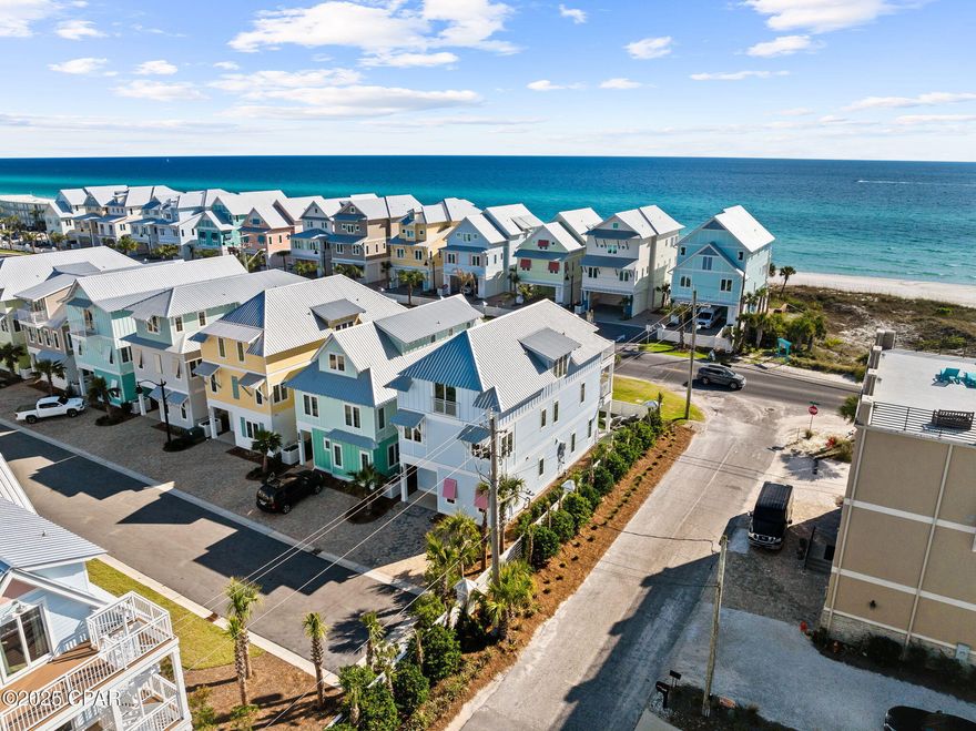 Investor Opportunity: High-Yield Beachfront Luxury in Margaritaville Beach Cottages Resort Investors, take note—this is the one! Positioned just one tier off the Gulf and located in the sought-after Margaritaville Beach Cottage Resort, this premium 3,223 sq ft, 6-bedroom, 6.5-bath coastal retreat is not just a vacation home—it's a rental powerhouse. This is the one savvy investors have been waiting for—a turnkey, revenue-generating luxury beach home in the sought-after Margaritaville Beach Cottage Resort. Located just one tier off the Gulf, this stunning 6-bedroom, 6.5-bathroom property spans 3,223 square feet and sits on a premium corner lot with unobstructed Gulf views from every level.

Professionally furnished and thoughtfully designed with high-capacity rentals in mind, this home is already a high-performing short-term rental with strong historical income and impressive occupancy rates. With six spacious king suites, a dedicated bunk room enclave, and expansive indoor/outdoor living spaces, the layout is ideal for hosting large groups, multi-generational families, and repeat vacationers seeking luxury on the Gulf Coast.From the moment guests enter, the home impresses with upscale finishes, including quartz countertops, coffered ceilings, high-end Frigidaire Professional appliances, and fun, coastal touches like a margarita machine and wine fridge. The private spa and multiple entertainment zonescomplete with a third-level game room featuring foosball and dartskeep guests coming back year after year.
Located just steps from 580 feet of private beachfront, the resort offers guests access to an incredible lineup of amenities including a 425-foot lazy river, waterslides, a poolside bar and grill, outdoor movies, fire pits, a dog park, and pickleball courts. A new on-site restaurant, fitness center, and kids' arcade just opened only adding to the already strong rental demand. Positioned minutes from Pier Park's shops, restaurants, and attractions - including the newly opened Pirates Caribbean Dinner Theatre (a Dolly Parton Company) and soon-to-open Top Golf, this home offers not just immediate income but long-term value in one of the Gulf Coast's most in-demand vacation rental markets. Whether you're expanding a short-term rental portfolio or seeking a luxury beachfront asset with serious income potential, this fully-furnished, turnkey, rental-ready home is an exceptional opportunity. Cheers to sun, sand, and spectacular returns. Schedule your private tour today and see why this rental-ready gem is one of the smartest investments on the Gulf Coast.