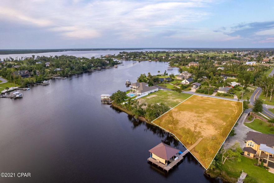 Rare opportunity to purchase a WATERFRONT One Acre Lot located on the highly desirable Anderson Bayou . This lot boasts of 155 Feet of waterfront with gulf access ready to build your dream home. Homesite has been improved with a brand new iron free deep water well, underground power, privacy fence along one side of property, magnolia trees and shrubs along the fence line with irrigation, city utilities readily available, and a boat house. Boat House consists of a 10 ft x 30 ft 10,000 lb lift and a 10 ft x 30 ft 6,000 lb lift for two boats, waverunner lift, water and power to dock and lights, with deep water access.  Lot can be subdivided into two waterfront lots. See MLS#716375 and 716376 Property is located in Flood Zone X.