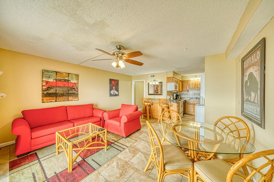 **UNDER contract, accepting backup offers** Lovely 1 bedroom/1.5 bathroom condo located on the fifth floor. Unit is equipped to comfortably sleep 6 people and is currently on a rental program. The primary bedroom offers a Queen-sized bed and there is bunk space in the hallway as well as a sleeper sofa in the living area. 

Relax and watch TV in the living area or listen to the sounds of the Gulf waters as you take in all of its Emerald beauty. The fully equipped kitchen will allow you to cook all of your favorite meals while enjoying them in either the dining or bar area. 

The Summit is a family friendly resort with loads of amenities and is located directly on the Gulf of Mexico. HOA fees include use of large pools, a Tiki bar, large beach area, tennis courts, fitness room, and much more