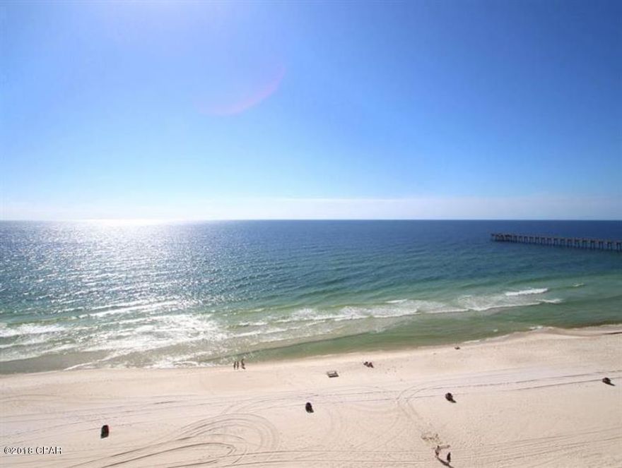 Calypso Resort is calling your name!!! This LOW FLOOR 2BR / 2BA PLUS BUNK is one of the most coveted floor plans on the beach!!! You or your guests will admire perfect views of the white sand beach and emerald waters from the wonderfully spacious living area. Relax in comfort as this unit feels and sleeps like a 3 bedroom condo. The Gulf front master retreat has a private entry to the balcony, plus a walk-in closet and an en suite bath with granite countertops and double vanity. Wooden floors in the master bedroom, bunk room and great room.  PREPAID 2018 SEASONAL BEACH CHAIRS will convey with purchase. This is a fantastic investment property in one of the most popular vacation destination condos on Panama City Beach, offering amenities such as two Gulf front pools,tiki bar, fitness center and parking garage with walk-over. Plus Calypso Resort truly has the best location on the beach! Located right across from the popular Pier Park, you are within walking distance of all the great shops, restaurants, attractions and all of the wonderful events hosted there! So don't wait...come see for yourself today!!! Interior photos coming soon. All dimensions are approximate and should be verified by the Buyer if important.