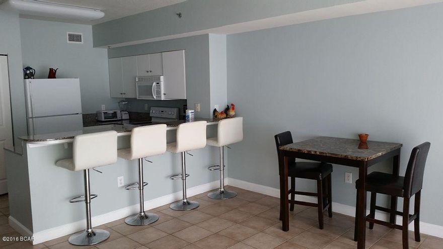 Just Reduced! Shores of Panama! Enjoy this Amazing Condo with your family for a lifetime! This unit sleeps 6 people. it has a great deck with beautiful views of the Beach and Ocean. The Master bedroom and a bunkroom, both with full baths. There is a private parking space on the same floor included with purchase!