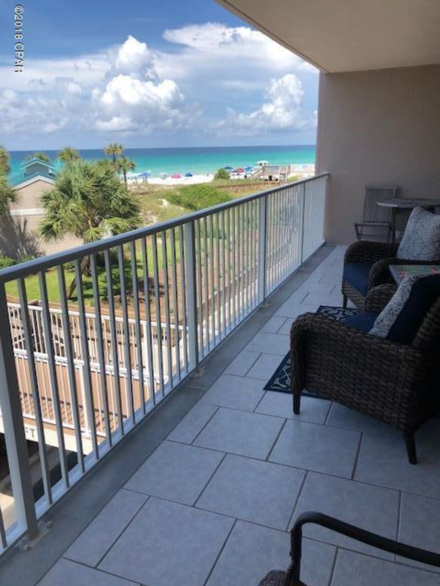 Located in the highly desirable B building, this GORGEOUS unit is located on the second floor and offers beautiful views of the gulf and pool areas. This 2 Bedroom, 2 Bath unit is rental ready, fully furnished and ready for you. Enjoy beautiful Gulf views from your balcony and enjoy all the Dunes of Panama amenities to include:  3 Gulf front pools (one is heated), fitness room, tennis courts, and shuffle board. The Dunes of Panama is situated on 1500 feet of pristine gulf front on Thomas Drive. This second floor unit is BEAUTIFUL with tiled floors and granite countertops in the kitchen and the bathrooms, a pantry, with plenty of counter space and cabinets. This gated property is 2.5 miles from St. Andrews State Park, 8 miles from Pier Park and close to many local restaurants, shopping and entertainment.