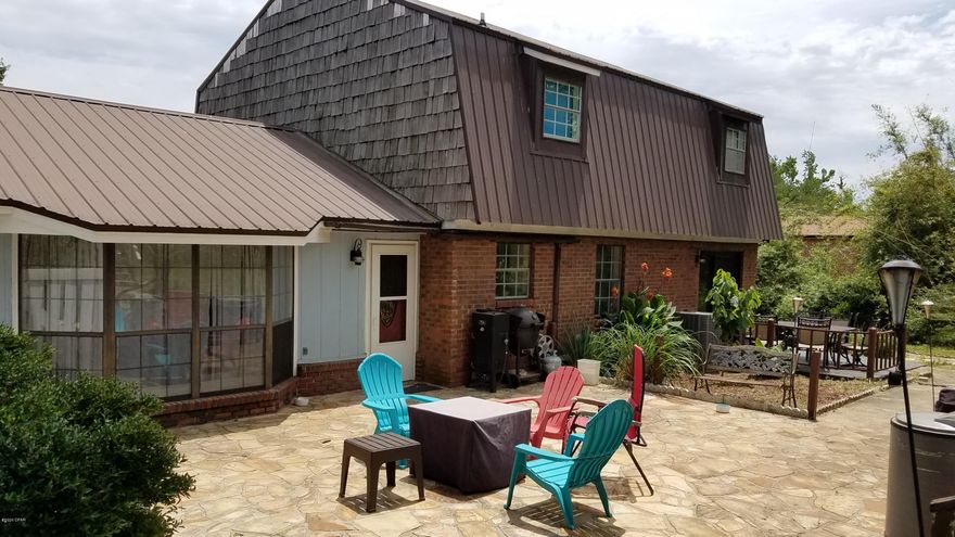 Beautiful 3 Bedroom 2 1/2 bath POOL home located in Marianna City Limits! Close to all shopping, Hospital and Chipola College!! The Large Living room is perfect for entertaining your guests! The kitchen has been updated in the last 4 years including appliances, soft close cabinets, Farm sink, center island and quartz countertops. Formal Dining room overlooks the backyard. There is an office on the first floor that can be easily converted to a 4th bedroom. Large separate laundry room with plenty of storage. The master bedroom and 2 additional bedrooms are on the 2nd floor. The inground pool is fenced for privacy and is perfect for you to relax in on these hot summer days! The backyard has a 2 story workshop, patio area and has plenty of room to play!