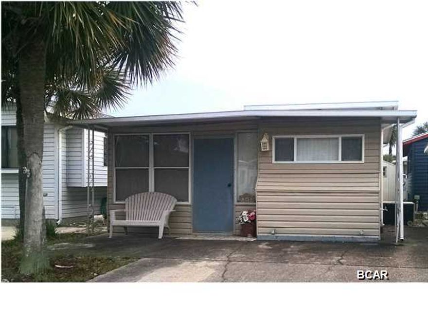 Here is your very own vacation home or rental investment! A great unit with all the space you need to spend a relaxing time at the beach, with storage space! There are two comfortable-sized rooms with beds, but the second space does not include a closet and cannot be counted as a bedroom. The large bathroom is conveniently located between both rooms, providing easy access. This property comes furnished with the essentials, making your transition to ''beach life'' as stress-free as possible. Whether you're familiar with Venture Out Resort or new to the family-friendly golf cart community, this is a considerable opportunity to have PRIVATE access to the World's Most Beautiful Beaches and Grand Lagoon, a playground with swings, TWO saltwater pools, tennis, basketball, AND shuffleboard court a fishing dock, a boat launch, and more! This unit has a BRAND NEW A/C unit, purchased Sept.2015, and the entire roof has been sealed, with a 50 year warranty. The property is a MUST SEE in Venture Out's market.