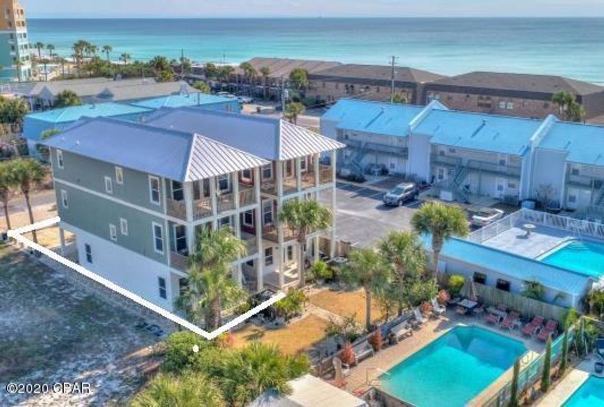 Beautiful beach home with Gulf views only steps to beach access #16.. This 2,484 sq.ft, 4 Bed 4 Bath beach home with lots of upgrades was custom built by highly respected Ledman Construction. Features include 1.5 car garage for one vehicle and a golf cart, an open kitchen/living area with hard wood floors and high ceilings on each level and dedicated dining space that opens to a balcony facing the pool and views of the Gulf. A gourmet kitchen with granite counter tops, an abundance of gorgeous cream colored cabinets, stainless steel appliances and beautiful lighting. Breakfast bar and built-in bookshelves complete the custom look. Windows abound for beautiful natural light. Crown molding and recessed lighting are throughout home. Shared with only the house next door, a sparkling in-ground pool is steps from your door or take a short walk to the beach access #16 close by. There is a small HOA among the two dwellings for pool and yard/landscape maintenance.

The master suite enjoys a luxurious en suite bathroom with walk in shower and jetted tub, large double vanity and two walk in closets. Additional bedrooms are strategically located on each of three floors, all with private balcony and bathrooms. The garage can hold one vehicle plus a golf cart, and natural vegetation offers privacy not often found this close to the beach. The house can sleep up to 15 people and has done upwards of $90K gross rent annually and stands ready to serve as either a primary residence, vacation home, investment/rental property or retirement home.  Buyer should verify all data and dimensions.  Call today for a showing.