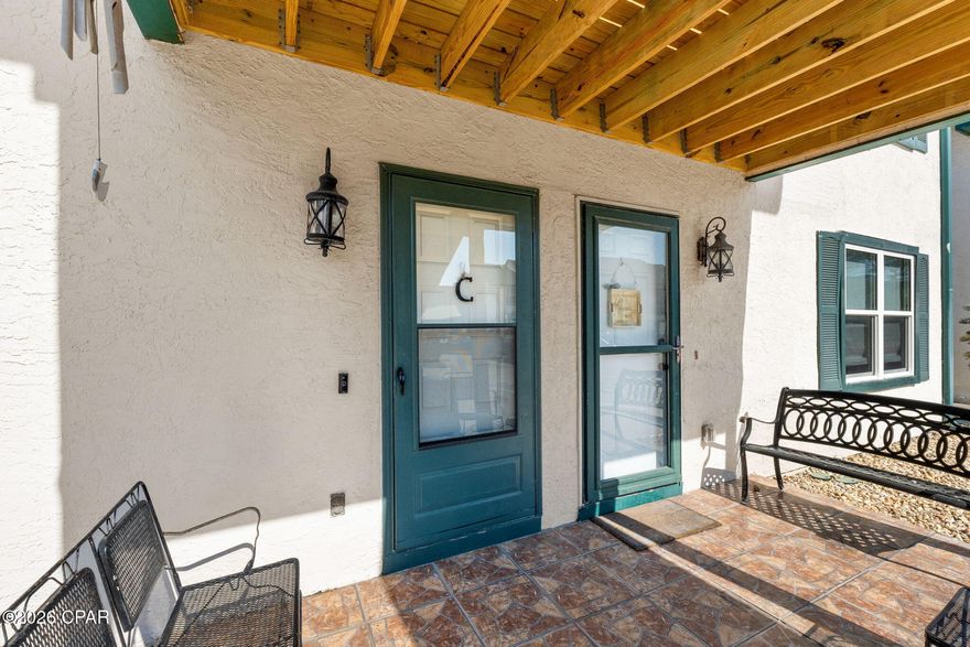 This 2 Bed / 2 Bath condo is  located in Greenwood Estates on the East End of Panama City Beach. This ground floor condo is just a short walk to the Lagoon.. The condo features an open floorplan with plenty of natural light. This is the perfect condo for full-time living or weekend retreats.  Short-term rental is not allowed.  It's being sold partially-furnished.  The living room furniture and bedroom furniture convey with purchase.  The following items do not convey:  Small makeup station in bedroom, TV stand in living room, kitchenware, pots / pans, personal items such as clothes / linens and family photos. Greenwood Estates offers a community pool and a large pavilion. Nearby attractions include Captain Andersons Marina and St. Andrews State Park. There are also many dining, shopping and entertainment options a short stroll away. Schedule your showing today!!