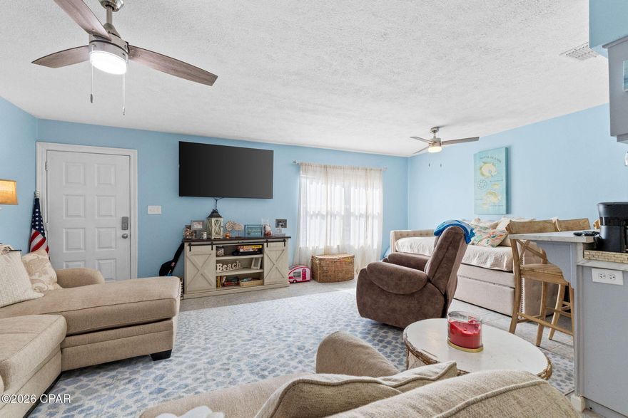 This 2 Bed / 2 Bath condo is  located in Greenwood Estates on the East End of Panama City Beach. This ground floor condo is just a short walk to the Lagoon. The condo features an open floorplan with plenty of natural light. This is the perfect condo for full-time living or weekend retreats.  Short-term rental is not allowed.  It's being sold partially-furnished.  The living room furniture and bedroom furniture convey with purchase.  The following items do not convey:  Small makeup station in bedroom, TV stand in living room, kitchenware, pots / pans, personal items such as clothes / linens and family photos. Greenwood Estates offers a community pool and a large pavilion. Nearby attractions include Captain Andersons Marina and St. Andrews State Park. There are also many dining, shopping and entertainment options a short stroll away. Schedule your showing today!!