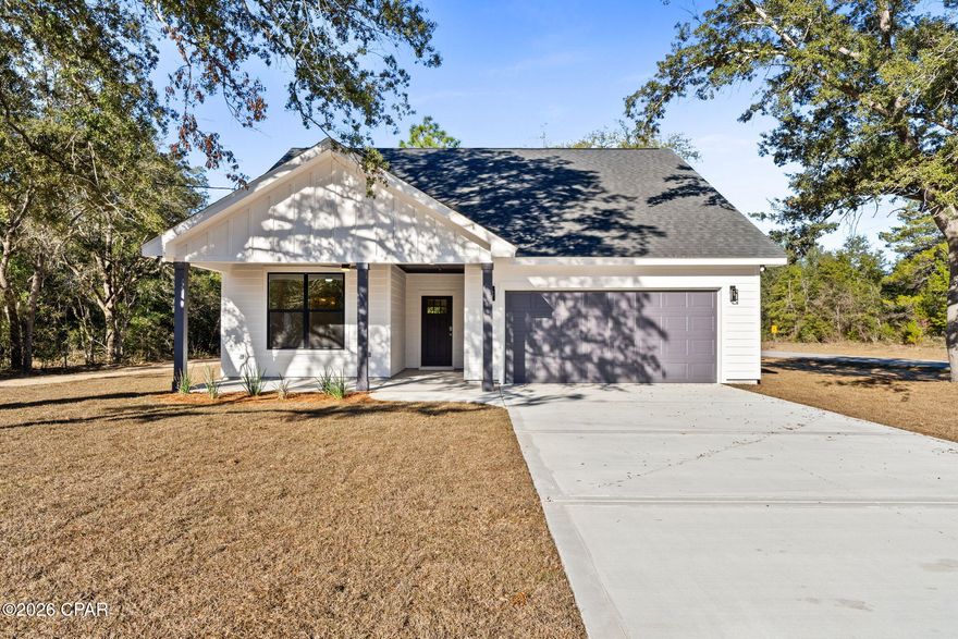 This exceptional new construction home offers a thoughtfully designed split floor plan and is situated on a corner lot just north of Boat Lake Swim Park. Built with Hardie board siding and architectural shingles, the home features elegant front and back porches that enhance both curb appeal and outdoor living.

Inside, the home showcases 9-foot ceilings, luxury vinyl plank flooring throughout, recessed lighting, and ceiling fans in the living room, bedrooms, and porches. The open-concept kitchen, dining, and living area overlooks the back porch and backyard, with expansive windows that flood the space with natural light and create a bright, airy feel.

The kitchen is beautifully finished with stainless steel appliances, quartz countertops, under-cabinet lighting, and a full-height quartz backsplash, offering a clean, modern aesthetic. The private primary suite serves as a relaxing retreat with a custom tile shower.

Built with comfort and efficiency in mind, this home includes spray foam insulation in the attic and batt insulation in both exterior and interior walls, enhancing energy efficiency while also offering additional sound reduction between rooms. Additional highlights include a tankless electric water heater and stand-up attic storage above the garage—details that elevate everyday living and reflect the quality craftsmanship throughout.