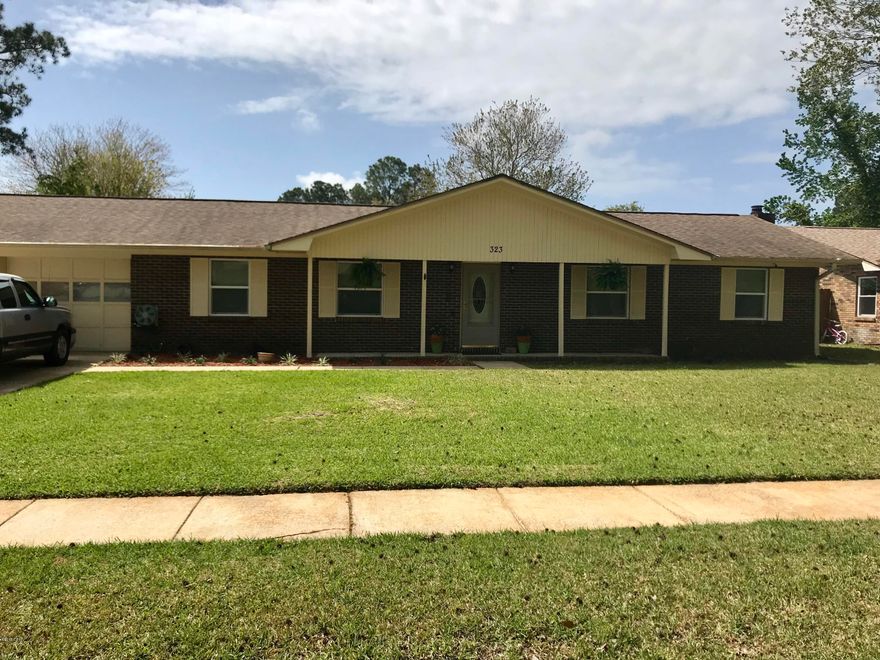 Solid home in an established neighborhood awaits your approval. Situated in Lynn Haven's Belaire Estates subdivision, this home offers many updates and improvements.  This three bedroom ranch style was completely renovated to include tile flooring, new bathroom fixtures, HVAC system, crown molding, windows, and a complete kitchen makeover. The home is set up with state of the art wireless internet and security system. You'll appreciate the built-in bookcases, wood burning fireplace, built-in kitchen side bar, and the butler's pantry. The master bedroom is spacious and is adjoined by a renovated bathroom. You'll make good use of the Florida room that offers natural light and a place for exercise equipment or additional living space. The backyard offers a raised wood deck for lounging, a yard building and a self watering screened garden plot.  Located just minutes from shopping, hospitals, and both military bases, this home is affordably price, well maintained and expertly updated to make it the gem of the neighborhood.  Don't miss this opportunity live own this fine home. Schedule your appointment today because this one will go quick.  All sizes are approximate, please measure to be sure.