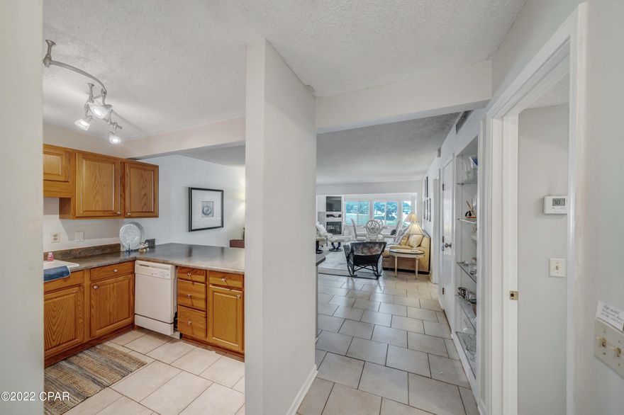 CURRENTLY UNDER CONTRACT, SELLER ACCEPTING BACKUP OFFERS.  Location is everything and this condo has it!  This well maintained Condo is in the upscale gated community of Bay Point.  The condo is located across the street from the newly rebuilt Point South Marina Bay Point.  The back of the condo overlooks a pond with fountain and the #1 Green of the Jack Nicklaus Golf Course.

This spacious condo has updated tile flooring in the living areas, updated bathroom and a sitting room overlooking the Nicklaus course.  The unit has a new A/C installed in 2020 and new windows that were installed in 2019.  The complex has a new roof that was installed in 2019, new hardy board plank siding, updated landscaping and a parking lot that has just been resealed. Bay Point is not just a neighborhood, it is a Lifestyle. Get on your golf cart and cruise around the community, play a round of golf, visit the spa, take a yoga class, enjoy a fine dining experience, dip your toes in the sand, join the boat club or enjoy some fish tacos and a cold beverage while taking in views of the bay with some of your neighborhood friends.