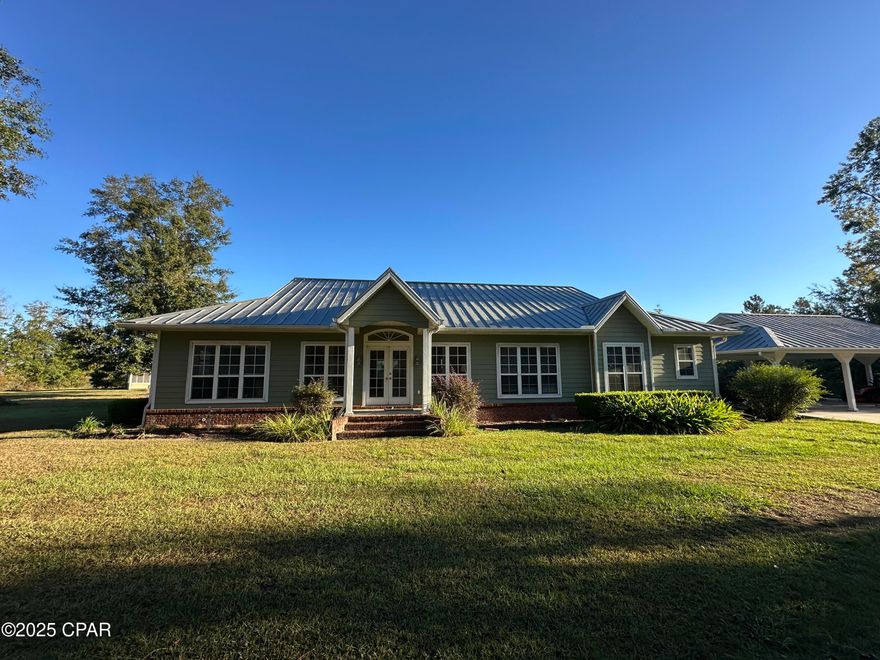 Rare Find! 4BR/3.5BA Home on 16 Private Acres with Pond, Barn & More

Welcome to your dream retreat — a true unicorn property nestled on 16+/- serene acres featuring a private pond, Florida room, and a standing seam metal roof built for a lifetime.  

This spacious 4-bedroom, 3.5-bath home offers both comfort and versatility. The primary suite includes a cozy sitting room, perfect for quiet mornings or evening relaxation. The Florida room brings the outdoors in, overlooking peaceful natural surroundings.

Step outside to enjoy a 3-car carport, a barn with a half bath, and a screened cook shed — ideal for entertaining, hobbies, or storage. The property's layout ensures total privacy, surrounded by beautiful acreage that's ready for horses, gardens, or simply enjoying the tranquility of country living.

From the standing seam metal roof to the scenic pond views, every feature of this home has been thoughtfully custom designed.

Key Features:
	•	4 Bedrooms / 3.5 Bathrooms
	•	Florida Room & Sitting Room off Primary Suite
	•	3-Car Carport
	•	Barn with Half Bath & Screened Cook Shed
	•	16+/- Acres with Private Pond
	•	Standing Seam Metal Roof
	•	Extremely Private Setting
	•	One-of-a-Kind ''Unicorn'' Property
        •      Hour Drive to Beach
        •      Hour Drive to TLH, ECP, and DHN Airports


This is the property everyone dreams of but rarely finds — don't miss your chance to own it!  This is Florida living at it's finest!

Seller is related to broker.