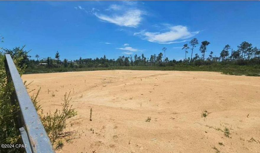 Located in the serene outskirts of Panama City, this expansive vacant lot at 2204 BJ Dr offers over 2 acres of pristine country living. Situated off a quiet dirt road, this property provides the perfect canvas to build your dream home exactly to your specifications. Imagine waking up to the tranquil sounds of nature, with ample space for gardens, outdoor activities, or even a small farm. Embrace the freedom to create your ideal retreat while still being within convenient reach of the amenities and attractions of Panama City. This is a rare opportunity to own a substantial piece of land where the possibilities are truly endless. Don't miss your chance to turn your vision into reality on this beautiful, spacious lot. The seller has cleared off 1 acer of the land the rest is still wooded. There is also a shed with a reserve water tank for rain water. The seller also has a survey that was done in the last 2 years. Don't miss this one! it ready to be built on. 100% Financing Available, ask for details!
