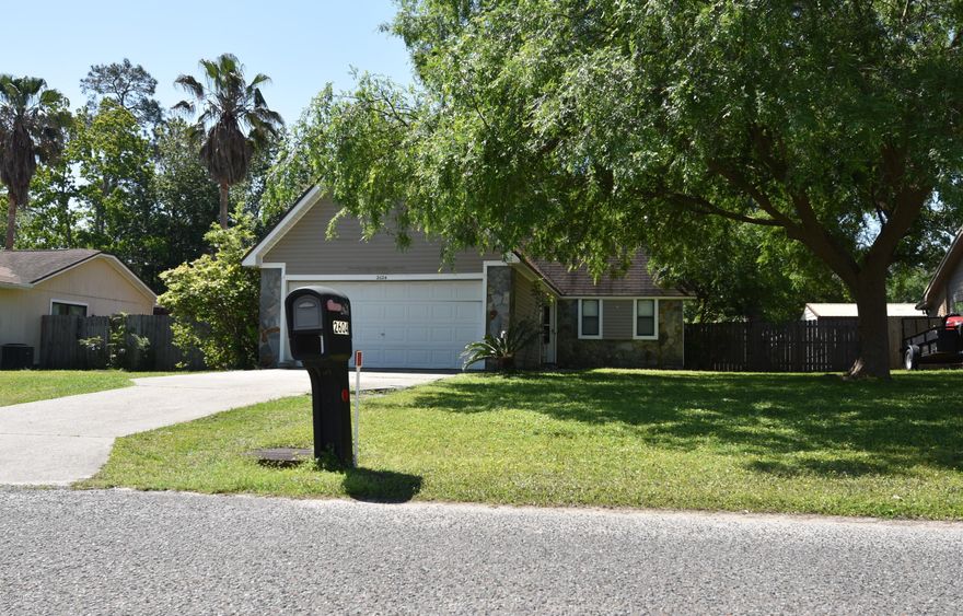 Greentree Heights - great location!  Within walking distance to Bay Haven Charter School ... within 1 mile to Mosley High School, shopping, dining & more.  Lovely home ... LR has stone woodburning fireplace ... separate dining area ... kitchen w stainless appliances ... smooth top stove.  Upstairs are 2 BR w full bath and loft area.  Downstairs LR floor is bamboo laminate ... tile in kitchen ... carpet in BRs. Large fenced in back yard ... completely new septic system in 2017. Tenant occupied ... excellent investment opportunity.  Don't wait!  Showings only on Friday from 1-4:15.  Call for appointment.