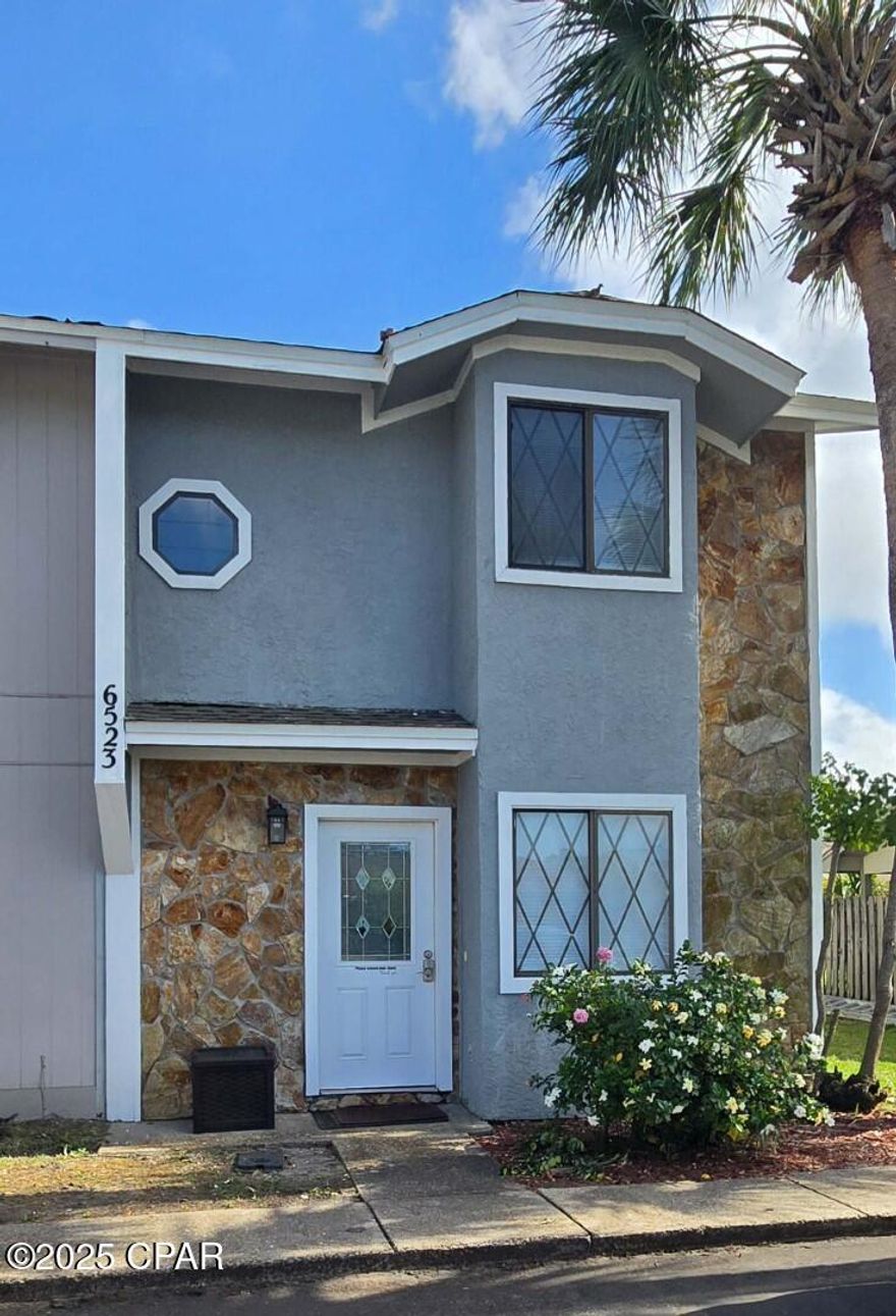 Absolutely picture-perfect Townhome & the Best Priced Townhome Available in Panama City Beach! This Adorable 1100+ square foot, Gated Neighborhood, 2 bedroom, 2.5 baths is centrally located in PCB for New Home buyers as well as great rental for investment. Located in the highly desirable GATED COMMUNITY of HARBOUR TOWNE. New siding, back decks and paint. The HOA in the One of the LOWEST in PCB at ONLY $173 and has 2 POOLS, Gated Entry, Tennis Courts, Pickle Ball & MORE!!!! HOA dues cover the 2 pools, tennis courts, Pickle Ball, PREMIUM CABLE, trash, CLUB HOUSE and ground keeping. The ABSOLUTELY BEAUTIFUL Harbour Towne location is just minutes to Pier Park, Navy Base, ''World's Most Beautiful Beaches'', NEW SPORTS COMPLEX, Gulf Coast State College, Dining, Shopping, Entertainment and ALL Bay County and Panama City Beach has to offer.