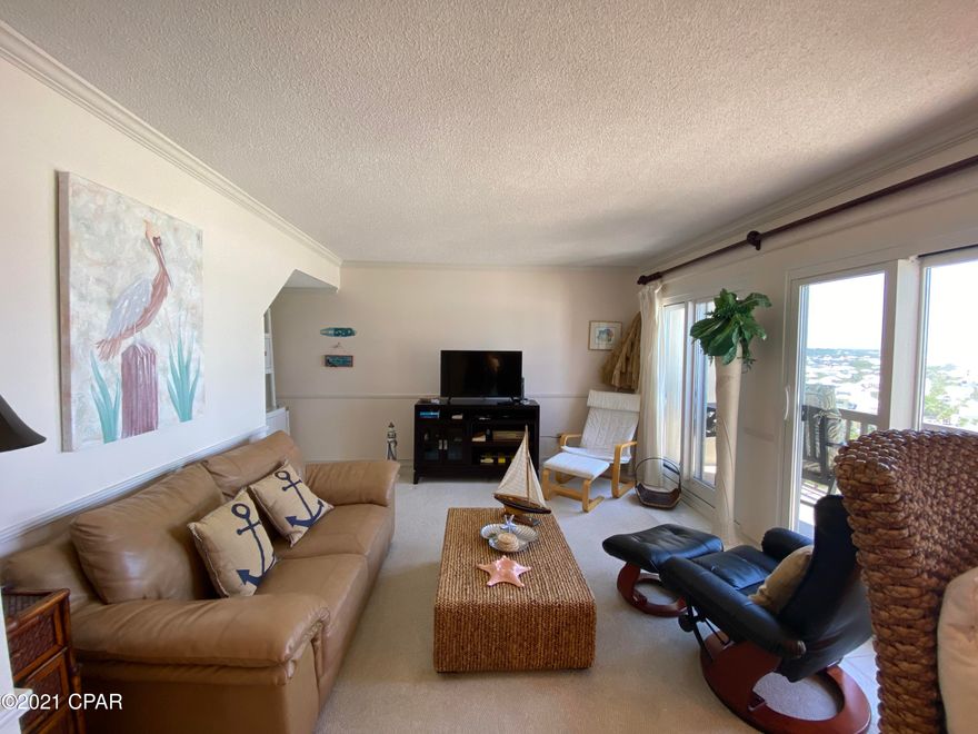 under contract, seller will accept backup offers.  Spectacular Gulf views from this 9th floor two bedroom unit.  Owners have lovingly cared for this second home and it shows.  Master and guest bathrooms have been updated with the Master bath featuring a jetted tub and the guest bathroom has an oversized tiled shower.  The kitchen features a unique ceiling treatment and is open to the living and dining area.   The living room and its balcony overlook the Gulf, the Beach, and the coastline back to the East.   Fully furnished and ready for your enjoyment.  

Pinnacle Port Resort is situated on a 25+ acre site within a beautiful gated community having over ¼ mile of beach frontage! The complex has lots of amenities including two swimming pools, tennis courts sauna/steam room, fitness room, its own private freshwater dock with boat slips boat launch and wi-fi.   Please note that the Association fees include electricity for heating, cooling and hot water.  The owner pays a small electricity bill for lighting and appliances only.