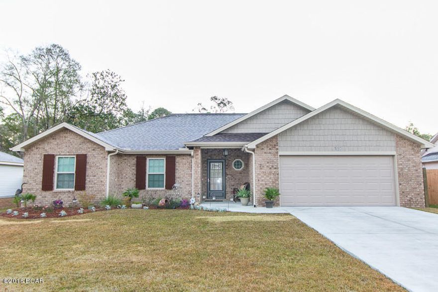 Home approximately 30 days from being complete. Top quality construction at an affordable price! Don’t be fooled by the mass production builders out there. Our custom style quality far exceeds the competition. This 4 bedroom (split floor plan), 2 bath home is located on a corner lot in a great area. High-end porcelain tile that looks like natural wood is throughout the foyer, kitchen, dining, and living area. The kitchen will feature granite countertops, custom style cabinets, stainless appliances, and a 7ft. breakfast bar. The open floor plan gives the home a much larger feel than it is.  In the living room you’ll love the tray ceiling, high baseboards, and tons of natural lighting. The oversized master bedroom features a 8.6x6.6ft walk-in closet that all the ladies will love! The exterior of this home will be a brick front with cedar shake accents, 30yr shingles, and a great size yard. Home is under construction and will be completed mid March. For more information or pictures of what the finished product will look like call us today!