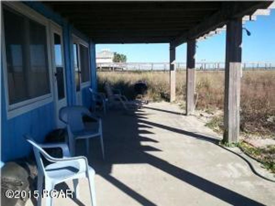 For Rent, long-term only. $950 monthly includes utilities for this completely furnished, cute, cozy & bright beach front efficiency apartment. Furnishings include a King bed and a double futon, fully equipped kitchen, much more. Step out the beach-side door to the covered patio, then down a path to the beach. Can't get better than this for the money