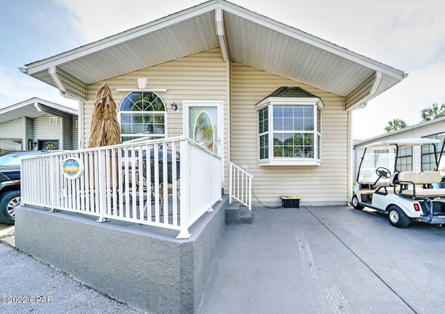 CURRENTLY UNDER CONTRACT, SELLER ACCEPTING BACKUP OFFERS Looking for fabulous? Look no further! Check out this beautiful 3 bedroom, 2 bath home. This home has new flooring, paint, appliances and furnishings. Stunning open floor plan with large rooms throughout. Home will be sold completely furnished with a golf cart. Perfect fit for an investor or second home. It doesn't get better than this! Venture Out is a golf cart community that has exploded with popularity recently... With 300' on the beautiful pristine beaches of the Gulf of Mexico and 1,000' on the Grand Lagoon. Venture Out has something for everyone. With 2 pools, fishing pier, boat ramp, mini golf, & more!