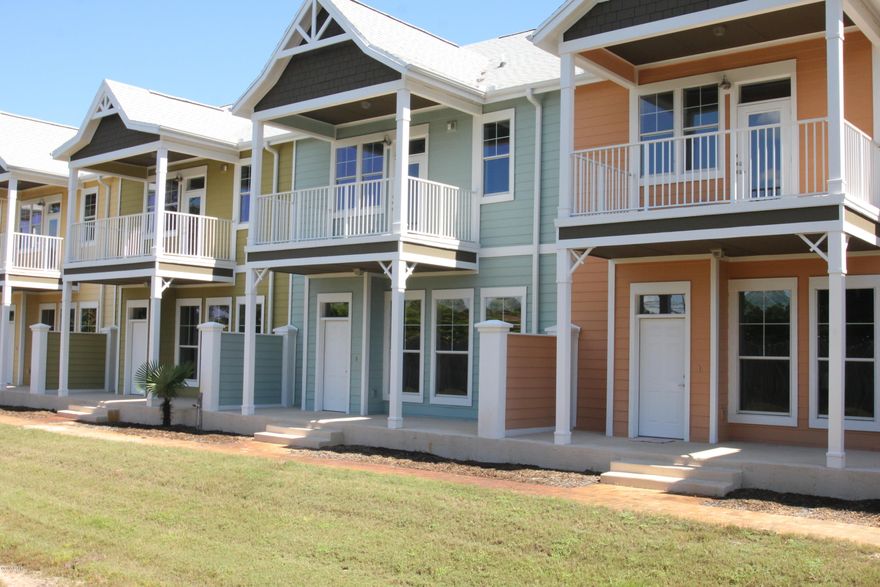 Its like owning a Home without any maintenance. These townhomes have all the same great amenities and luxury that you would expect from an upscale community like Island Reserve. These beautiful two-story townhomes boast 3 bedrooms, 3.5 baths. Every bedroom has its own Bathroom with 2200 square feet of H/C living space. Each townhome has its own double car garage, front and rear entries, first floor patio, and second floor balcony just off the Master Suite. Open concept layout with a large living room equipped with arched openings leading you into the dining room and kitchen. Living room is 20x18 and features a built in wet bar with matching granite countertops, and an owners closet. The kitchen is magnificent and has beautiful granite countertops, custom cabinets, brand new stainless steel appliances, an island with bar seating, and an oversized pantry. The dining room adjacent to the kitchen is large enough for everybody and is lined with windows looking out to your private courtyard, thus allowing plenty of that natural Florida sunlight to shine through when you want it. Down the hall connecting the garage to the kitchen is a good sized laundry room and half bathroom. Upstairs you'll find 3 bedrooms each with their own bathroom, but none more stunning than the Master Bedroom Suite. Master Bedroom is very spacious with a sitting area near the entrance and your own private balcony overlooking the back of the complex. Master bath features a double vanity with granite tops, a big garden tub, separate shower and separate toilet area, as well as an enormous walk-in closet. Down the hall are the other two bedrooms both of which have good size and their own full private bathrooms. The Island Reserve complex has just as much to brag about as these townhomes. Throughout the complex you'll notice the beautiful fountains and lush landscaping as you make your way down to the pool, hot tub, or clubhouse area. The pool is perhaps the largest in Bay County with two waterfalls, a zero entry area, and a lap area for those who like to swim after a nice workout. The pool deck is equipped with plenty of tables and chairs for your convenience and there is also a separate restroom facility close to the pool so you don't have to go back to your townhome just to use the bathroom. Next to the pool is a separate Splash Pad area for the kids. Inside the Clubhouse is a heated and cooled indoor basketball court, as well as a state of the art fitness center with free weights and machines. On your way to the clubhouse you might run into one of the many friendly security guards who man this property day and night keeping everything in order. Island Reserve is a great community whether you are single, raising a family, or retired. Everybody is friendly and there is a strong sense of community here. If you want the best here at Island Reserve look no further than these brand new townhomes. These won't last long at this price. Resort Living close to everything in Panama City Beach. Beach is 1.4 miles away or 4-5 minute drive from Island Reserve. Please see in documents how you can save over $3000 per year here at Palm Villas compared to a similar home not in the Island Reserve community.