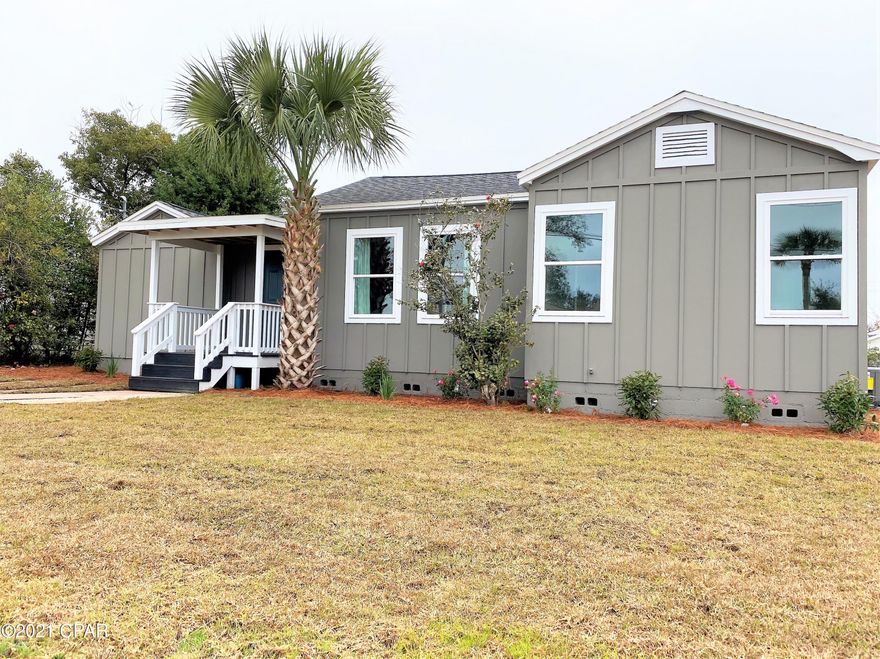 CURRENTLY UNDER CONTRACT, SELLER ACCEPTING BACKUP OFFERS.............................................HISTORIC COVE LIVING! Check out this completely remodeled adorable 3-bedroom 2 bath cottage. The home's curb appeal welcomes you with an updated Board and Batten exterior, inviting covered front porch and a beautifully landscaped front yard. When walking through the door, you are drawn to the bright open kitchen with custom backsplash, stainless steel appliances and spacious island topped with amazing white quartz countertops. Natural light streams in through the glass door that leads to a nice sized backyard with alley access. A small dining area, 2 bedrooms and a shared full bath are off the open concept living room. Privately situated on the opposite side of the house is, the master suit large ensuite bathroom with custom tile floors, tub,  surround, double vanity and the same beautiful white quartz counters. This home was taken down to the studs and completely rebuilt with all new sheetrock, HVAC, electrical, plumbing, windows, doors and tankless water heater. Located just a quick golf cart or bike ride away from the best restaurants and local venues historic downtown Panama City has to offer. As well as blocks away from beautiful St. Andrews Bay where you can enjoy spectacular nightly sunsets. Call today to schedule your showing!

Seller is a licensed Florida realtor.

(All sizes approximate and taken from public records, Buyer to verify any and all details Buyer deems important.)