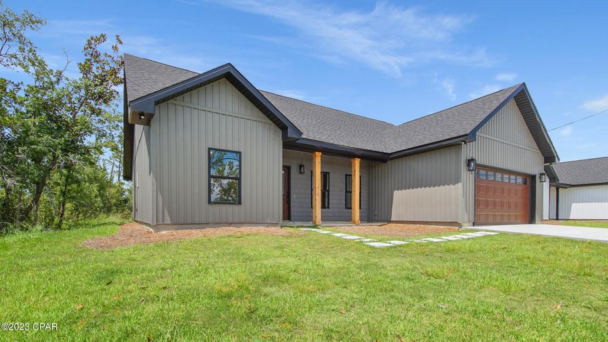 Sitting on almost a half acre, this beautiful craftsman style 3 bedroom/ 2 bath house located in the heart of Panama City is just a short drive to Tyndall, downtown Panama City, local shopping, restaurants, and the world's most beautiful beaches. With construction completed in 2023 this brand new house is waiting for you to make it a home. Comes complete with stainless steel appliance package, farmhouse sink, solid surface countertops, LVP flooring, walk in pantry, custom tile shower, walk in master closet, huge covered back porch, and very large back yard. Also comes with a one year builder's warranty. Call today for your personal showing.
*At list time, a few items may be still need to be added by builder prior to sale. ie:barn doors, shower door.