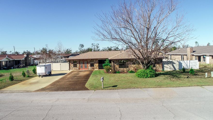 All Stone home on spacious .32-acre lot located in desirable subdivision of Imperial Oaks, minutes to Tyndall AFB, Eastern Ship Building, Paper Mill, Shopping, Restaurants, and 30 min. to beaches. Home received minimal Hurricane damage. Home does have a new roof new gutters, new A/C units, new vinyl fence, new pool liner, hardware and pool pump, new chimney cap. All other minor repairs are done. Home boasts an open floor plan between the kitchen dining and family room, perfect for entertaining. Kitchen has been up graded with new cabinets, solid surface counters and stainless appliances. All bedrooms are oversized with oversized closets. Home offers a game room, separate office, 60 x 10 screened patio, pool with extra decking, privacy fenced yard, utility shop with extra paved space.