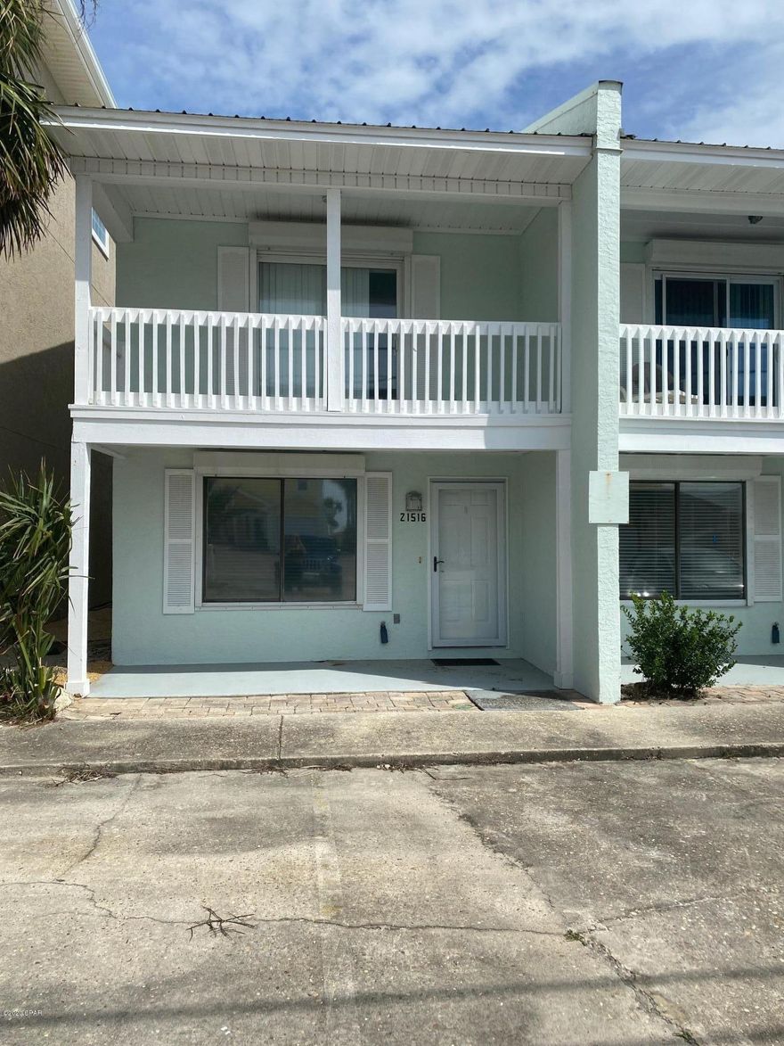 We love this home! This charming Riviera Beach Townhome is not only across the street from the beach but it has a gulf view from the balcony and this is an unit with a side walkway!There are NO HOA fees, it has a private patio and back yard. It is furnished nicely and is sold furnished. All you need is a swimsuit. The west end location is close to Pier Park, Carillon Beach and the 30A corridor. Come enjoy the beach Lifestyle and become a west end local! Riviera Beach has a wonderful community spirit which includes: chili cook offs, sunset gatherings, golf cart Parades & Holiday gatherings. This is a Very special Beach area! What an incredible opportunity to own a Townhome across the street from the Beach. Come see!